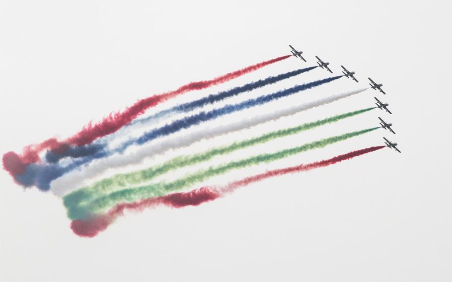 The Al Fursan aerobatic display team, from the United Arab Emirates, conducts a flyby during its performance at the Bahrain International Airshow Jan. 18, 2014.