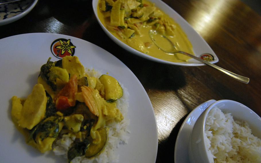 Zimtblüte restaurant in Einsiedlerhof, Germany, serves a variety of Asian food, including chicken and vegetables in a yellow sauce of green curry and coconut milk.