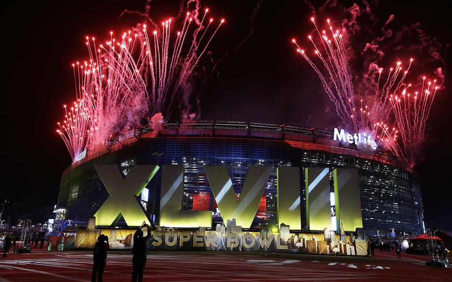 Fireworks burst over MetLife Stadium before the NFL Super Bowl XLVIII football game between the Seattle Seahawks and the Denver Broncos, Sunday, Feb. 2, 2014, in East Rutherford, N.J. (AP Photo/Seth Wenig)