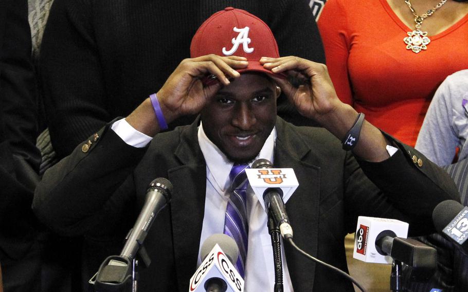 Rashaan Evans chooses Alabama as his destination to play college football Wednesday on national signing day in Auburn, Ala.
