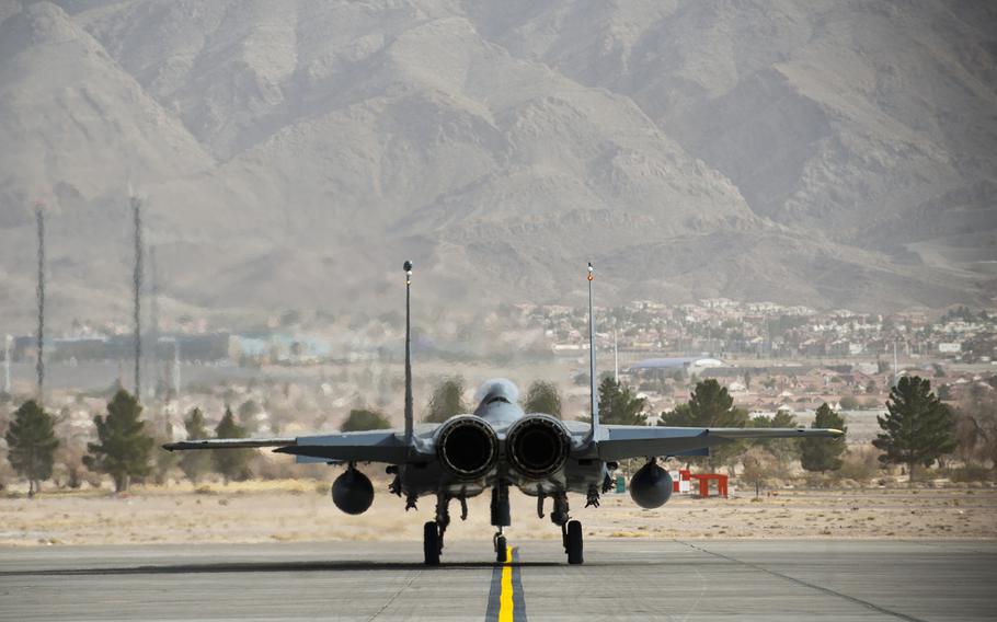 A F-15E assigned to the 391st Fighter Squadron, Mountain Home Air Force Base, Idaho, taxis to the runway during Red-Flag 14-1 exercise on  Jan. 30, 2014, at Nellis AFB, Nev. Red Flag is an opportunity for U.S. and allied forces to work and train together during realistic combat scenarios.