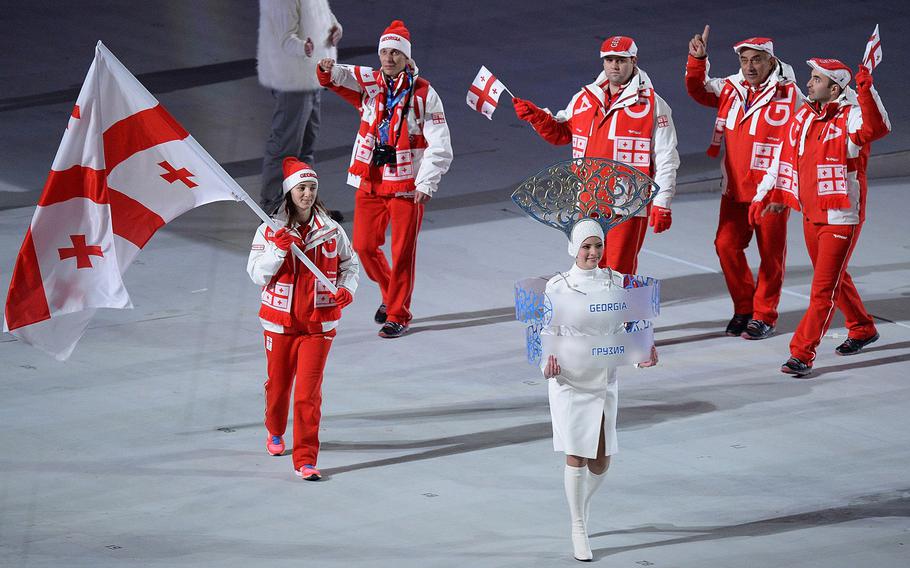 The team from Georgia enters Fisht Olympic Stadium in Sochi, Russia, during the Opening Ceremony for the Winter Olympics, Friday, Feb. 7, 2014. (Chuck Myers/MCT)