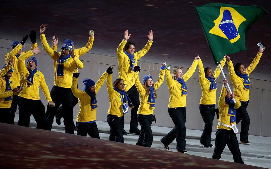 The team from Brazil enters Fisht Olympic Stadium in Sochi, Russia, during the Opening Ceremony for the Winter Olympics, Friday, Feb. 7, 2014.(Brian Cassella/Chicago Tribune/MCT)