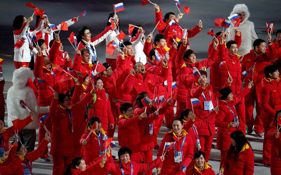 The team from China enters Fisht Olympic Stadium in Sochi, Russia, during the Opening Ceremony for the Winter Olympics, Friday, Feb. 7, 2014.(Brian Cassella/Chicago Tribune/MCT)