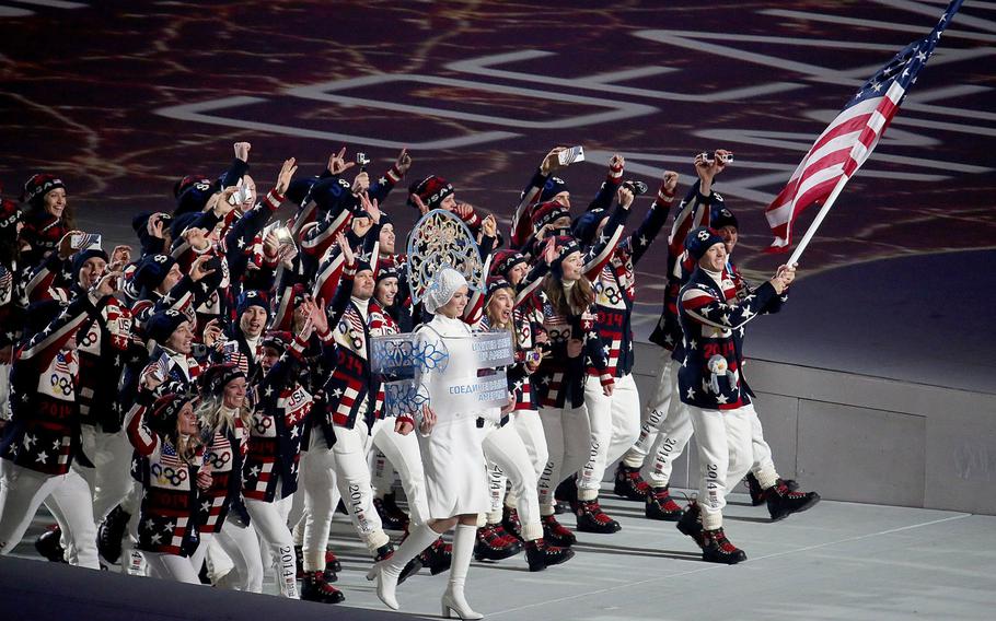 The team from the United States enters Fisht Olympic Stadium in Sochi, Russia, during the Opening Ceremony for the Winter Olympics, Friday, Feb. 7, 2014.