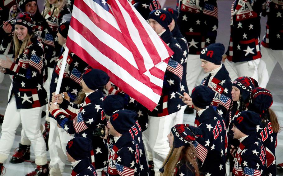 The United States team enters Fisht Olympic Stadium in Sochi, Russia, during the Opening Ceremony for the Winter Olympics, Friday, Feb. 7, 2014.(Brian Cassella/Chicago Tribune/MCT)