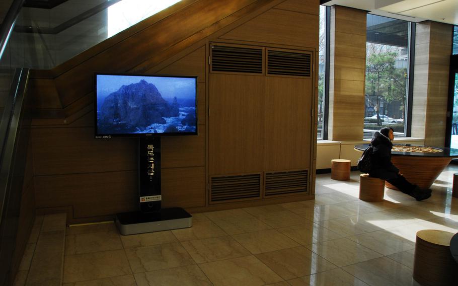 A live video feed showing the Dokdo islets is on display in the main lobby of an office building in Seoul. A Dokdo museum, one of about a half dozen in South Korea, is located in the basement of the building. Tensions over the islets, which are claimed by both South Korea and Japan, are viewed by South Koreans as the biggest obstacle to improving relations between the two countries, according to a recent study. The islands are called Takeshima by the Japanese.
