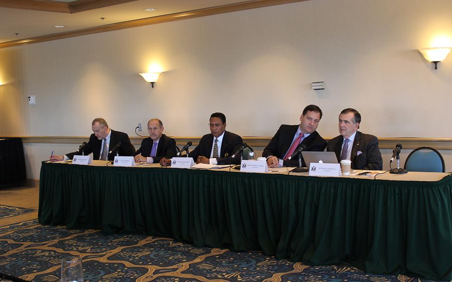 Members of the Military Compensation and Retirement Modernization Commission, from left, Michael Higgins, Dov Zakheim, Alphonso Maldon Jr., Christopher Carney, Peter Chiarelli, listen as San Diego military leaders answer questions about pay and benefits in March 2014 at the Hilton San Diego Airport-Harbor Island. The commission is charged with evaluating the military compensation and benefits system and making recommendations about how best to update it.