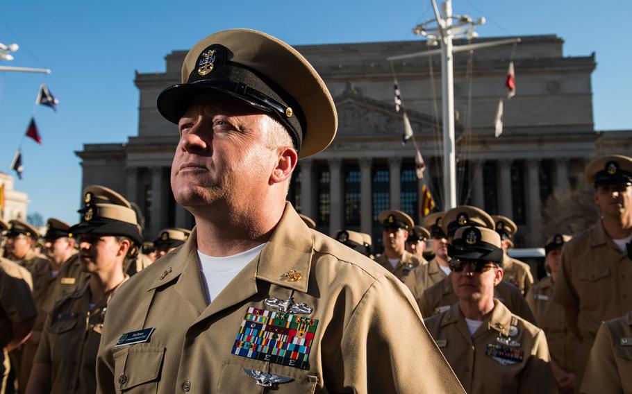 Command Master Chief James Honea, from Naval Support Activity South Potomac, leads a formation of chief petty officers during a celebration of the 121st birthday of the chief petty officer rank on April 1, 2014, at the Navy Memorial in Washington, D.C. Master Chief Petty Officer of the Navy Mike Stevens was joined by five former MCPONs and Ima Black, the widow of the Navy's first MCPON, Delbert Black, for the celebration.
