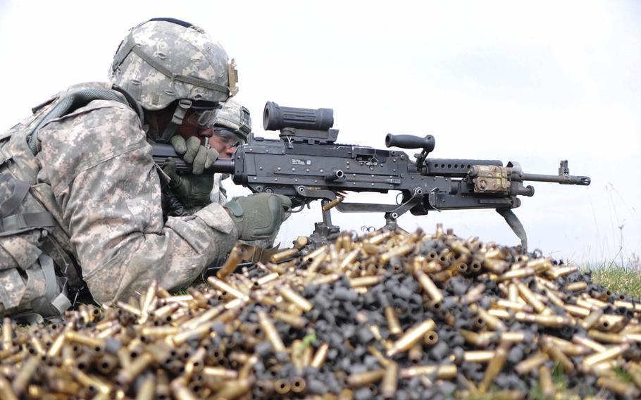 U.S. Army Pfc. Stephen A. Frazier, a paratrooper assigned to 1st Battalion, 503rd Infantry Regiment, 173rd Infantry Brigade Combat Team (Airborne), provides suppressive fire during a combined-arms live-fire exercise with 12th Combat Aviation Brigade, March 28, 2014 at the Grafenwoehr Training Area, Germany.
