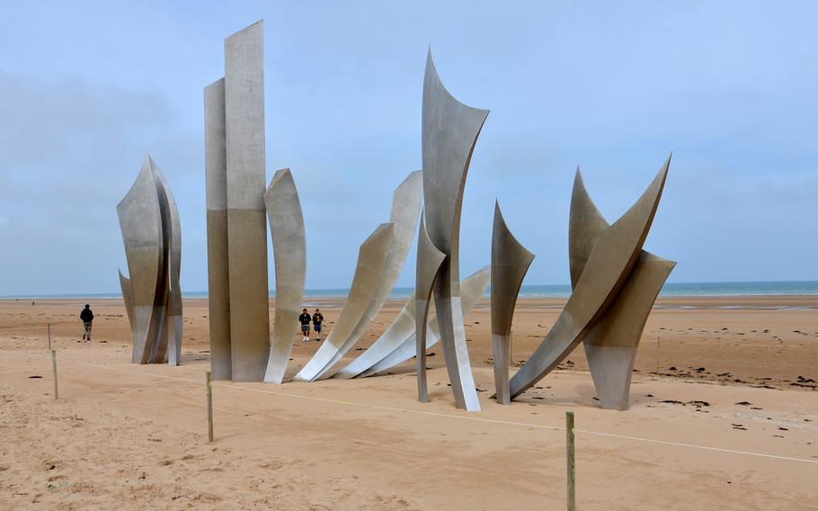 The modern stainless steel sculpture at Saint-Laurent-sur-Mer on Omaha Beach is more than 29 feet high at its tallest point and weighs 15 tons. Its pieces, from left to right, represent the wings of hope, the rise of freedom and the wings of fraternity.