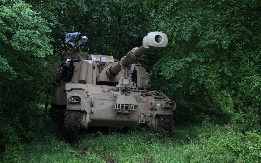 U.S. Soldiers of the 1st Brigade Combat Team, 1st Cavalry Division, conduct operations in a M109A6 Paladin howitzer during exercise Combined Resolve II at the Joint Multinational Readiness Center in Hohenfels, Germany, May 28, 2014.