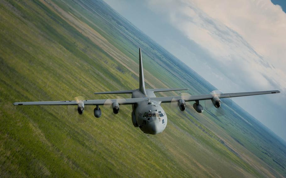 A U.S. Air Force C-130 Hercules aircraft with the 94th Airlift Wing, Dobbins Air Reserve Station, Georgia, maneuvers to avoid simulated ground-to-air threats during Maple Flag in Edmonton/Cold Lake, Alberta, Canada, on Monday, June 2, 2014. Maple Flag is an international exercise designed to enhance  interoperability of C-130 aircrews, maintainers and support specialists in a simulated combat environment.