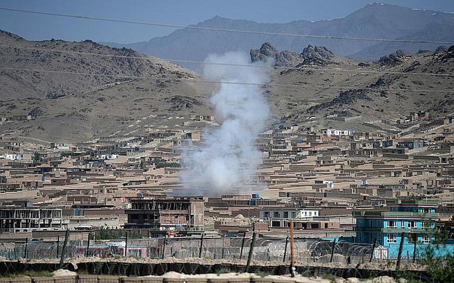 An improvised explosive device detonates in the middle of Maidan Shar, in Wardak province, Afghanistan on election day. Security was high as the Taliban vowed to once again try to disrupt the elections.