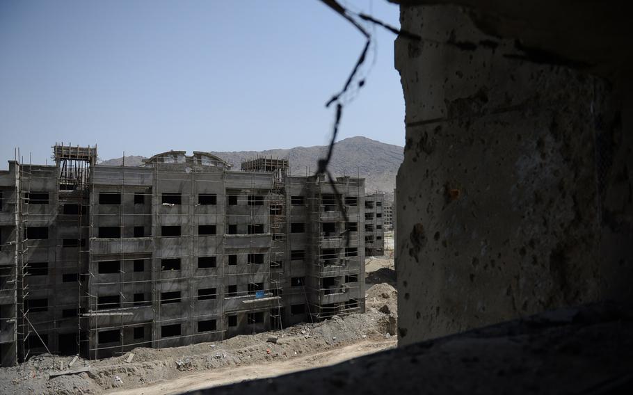 The bullet-marked view from a position used by Taliban gunmen near Kabul's airport. For hours heavy automatic gunfire and the explosions of rocket-propelled grenades used by both sides could be heard around Afghanistan's capital city on Thursday, July 17, 2014.