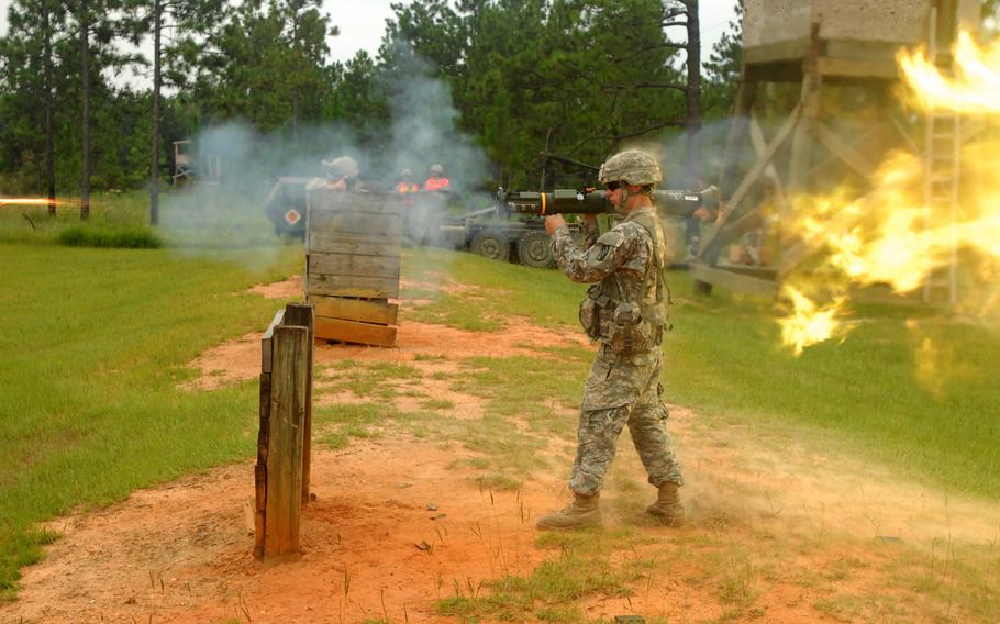 Pfc. Joshua Smith of Tylertown, Miss., fires an AT-4 Anti-Tank Missile Launcher during annual training at the Camp Shelby Joint Forces Training Center on July 31, 2014.
