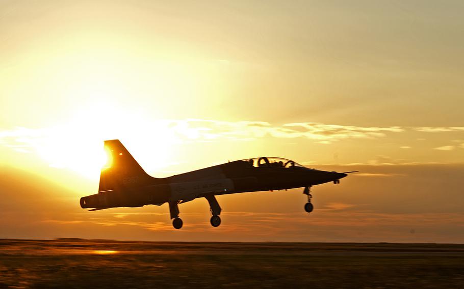 Pilots from the 80th Flying Training Wing Euro-NATO Joint Jet Pilot Training program fly into the sunrise Thursday, Oct. 2, 2014, at Sheppard Air Force Base, Texas.