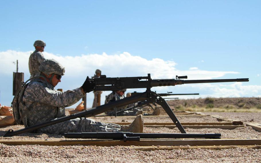 Spc. Christopher Nolen-Dunigans, radar maintainer, Company B, 4th Brigade Support Battalion, 1st Stryker Brigade Combat Team, 4th Infantry Division, fires three single rounds to zero an M2 .50-caliber machine gun during qualifications, Oct. 2, 2014. After zeroing their weapons, soldiers conducted day and night qualifications requiring they hit six out of 10 targets at ranges up to 1,500 meters away in order to qualify.