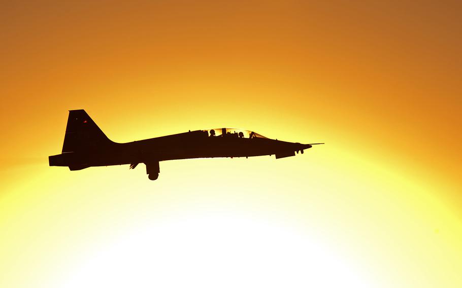 A T-38 Talon is silhouetted against the sun on Oct. 30, 2014. The Air Force on Wednesday, Nov. 22, 2017, released the names of two T-38 pilots involved in a crash at at Laughlin Air Force Base. Capt. Paul J. Barbour, 32, was killed and Capt. Joshua Hammervold was injured and is good condition.