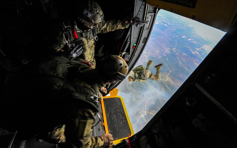 Airmen from the 24th Special Operations Wing jump out of an MC-130H Talon II at Hurlburt Field, Fla., on  Jan. 7, 2015.