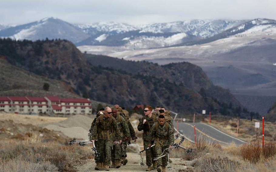 U.S. Marines with Combat Logistics Battalion 26, 2nd Marine Logistics Group, conduct a seven- mile hike at the U.S. Marine Corps Mountain Warfare Training Center in Bridgeport, Calif., Jan. 12, 2015. MWTC trains Marines across the warfighting functions for operations in mountainous, high altitude, and cold weather environments.