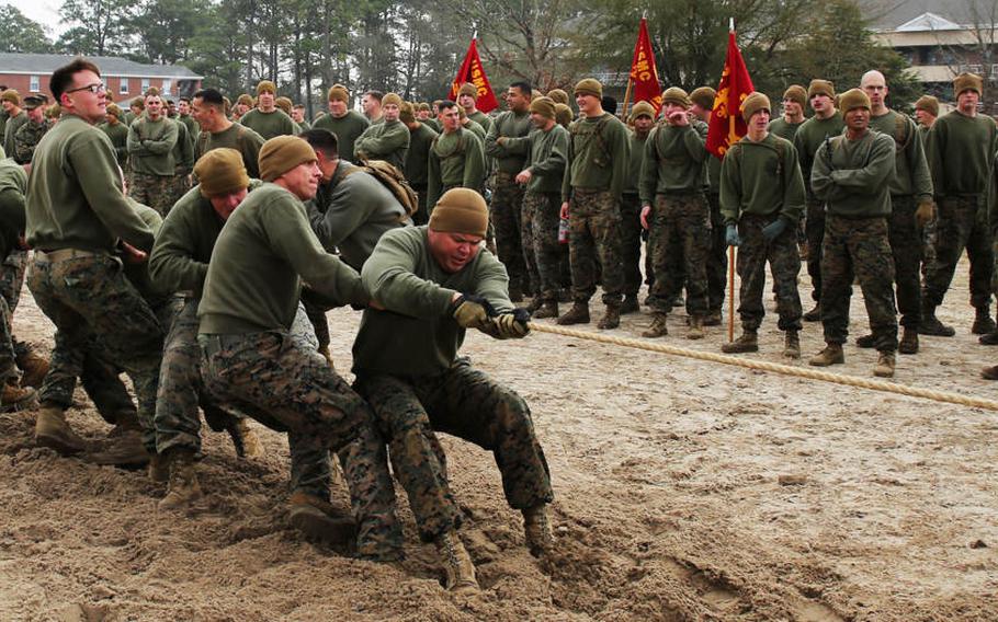 Marines with 2nd Battalion, 8th Marine Regiment, 2nd Marine Division, participate in a tug-of-war while competing in the Gladiator Games at Marine Corps Base Camp Lejeune, N.C., Jan. 15, 2015. The battalion holds the Gladiator Games competition once or twice a year to bolster morale and increase unit cohesion. The games consist of a 7-ton pull, fire-man carry relay, grappling, tug-of-war, tire flipping and more. The best company at the Gladiator Games wins the unit's gladiator helmet.