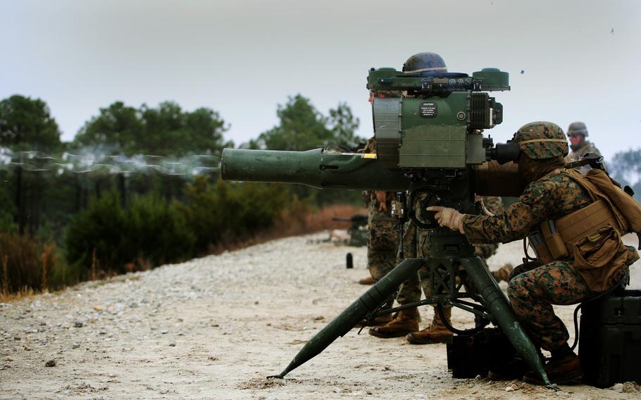 Sgt. Danielle V. Beck, anti-tank missileman, fires an M41A4 Saber missile launcher during a live-fire exercise at Range G-3, Marine Corps Base Camp Lejeune, N.C, on Jan. 14, 2015.