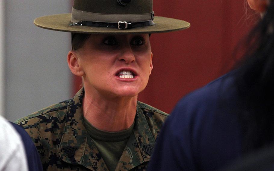 Drill instructor Sgt. Stevie Cardona gets poolees from Marine Corps Recruiting Station Columbia into formation during the semiannual Female Pool Function at Fort Jackson Army Base on Jan. 24, 2015.