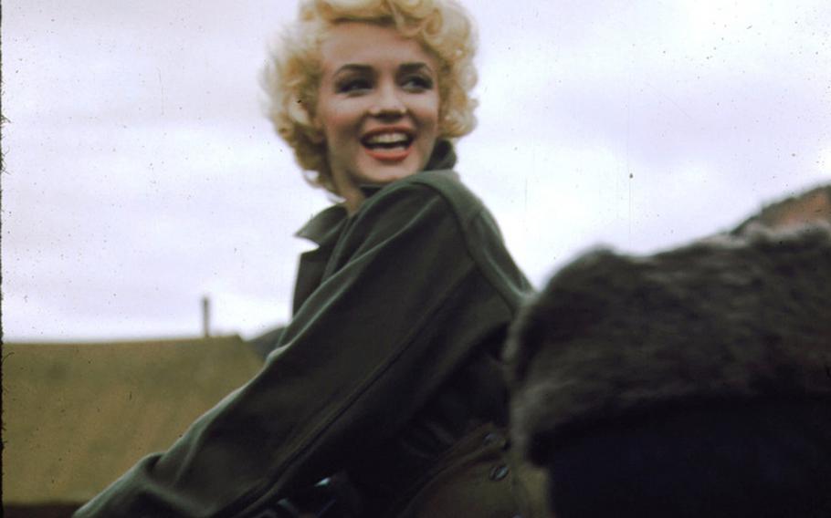 Marilyn Monroe greets the troops during her Korea USO tour in 1954.