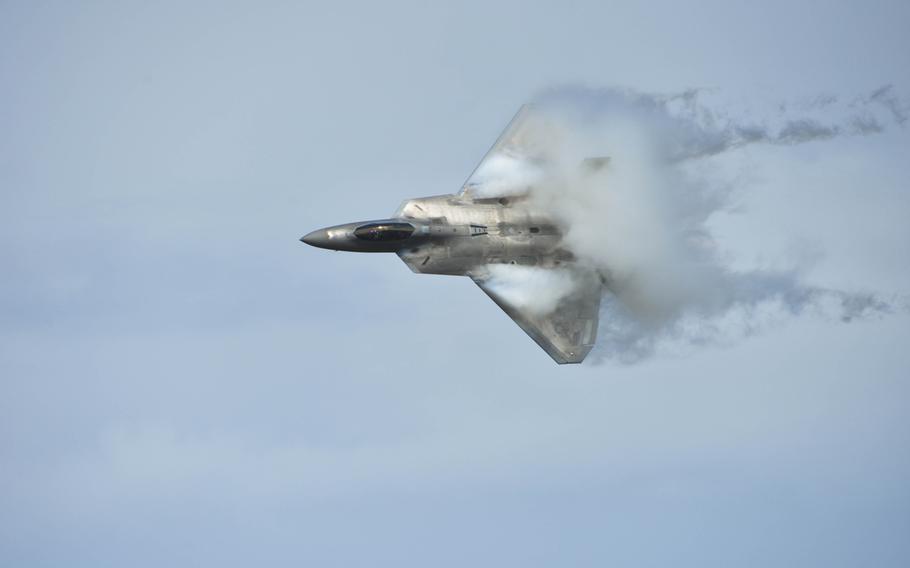 An F-22 Raptor takes to the sky at the Gulf Coast Salute open house and air show during a demonstration on April 11, 2015, over Tyndall Air Force Base, Fla.