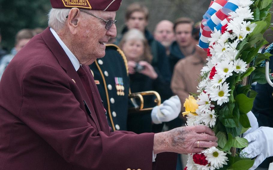 Bob Noble lays a wreath at the Tomb of the Unknown Soldier, Arlington National Cemetery, Va., on April 9, 2015.  Noble, 90, while serving with the 3rd Army in Europe during World War II. He was captured by the Nazsi and liberated after 122 days in a Nazi POW camp.