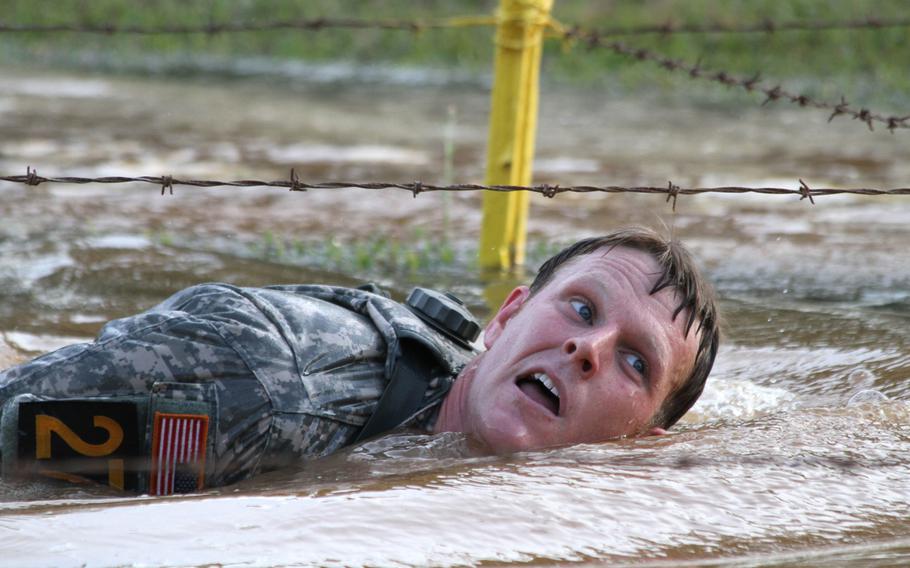 Staff Sgt. Philip Jewah takes part in the Malvesti Obstacle Course during the 2015 Best Ranger Competition at Fort Benning, Ga., on April 10, 2015.
