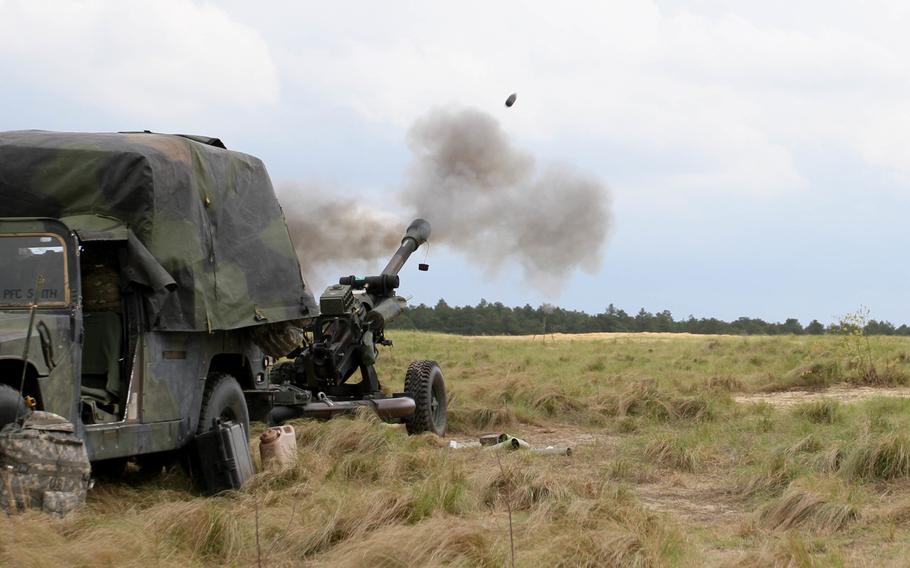 Paratroopers from the 2nd Battalion, 319th Airborne Field Artillery Regiment, 82nd Airborne Division Artillery, fire rounds from an M119A3 howitzer on Fort Bragg, N.C., April 14, 2015.