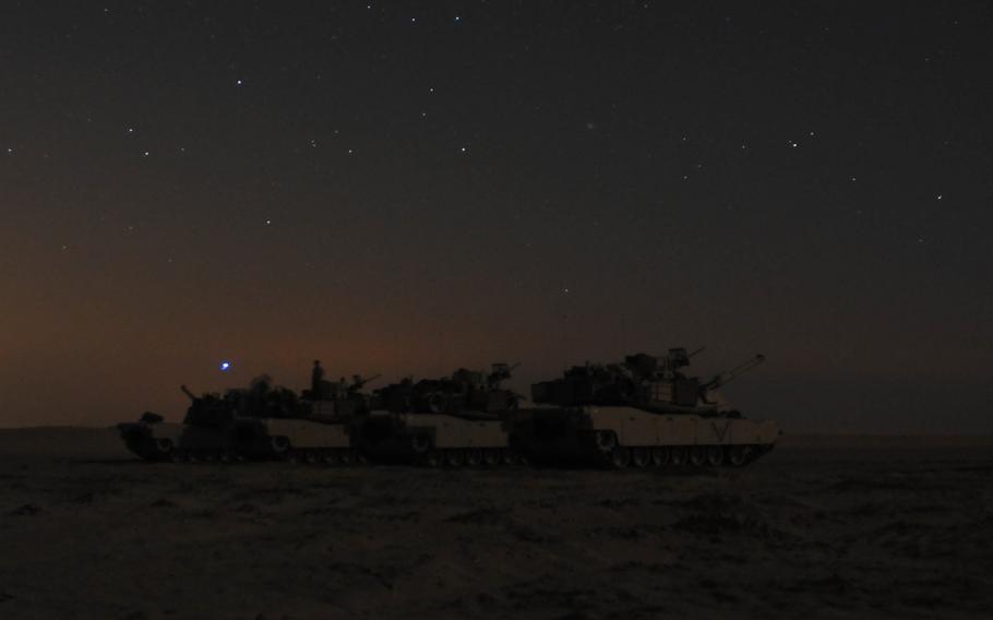 M1A2 Abrams tanks of 1st Battalion, 66th Armor Regiment, 3rd Armored Brigade Combat Team, 4th Infantry Division are prepared to begin Gunnery Live Fire Qualifications at the Udairi Range Complex, Kuwait, April 26, 2015.