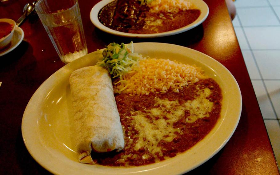 The chicken burrito plate, front, or the verde enchilada plate, which comes with a creamy chili pepper sauce, are two good choices at Honolulu's Azteca Mexican Restaurant.