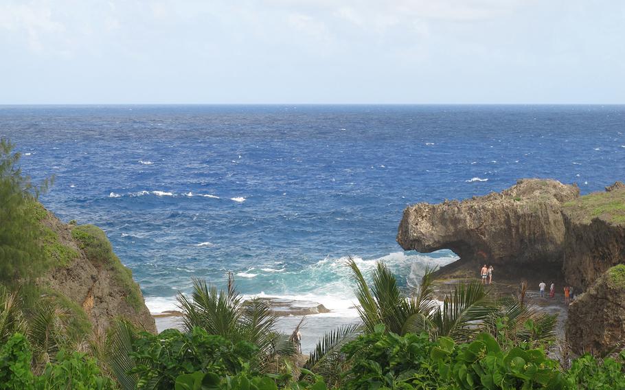 San Juan Beach and its crocodile-shaped rock are a gentle 20-minute hike -- or a short drive over dirt and rock -- from the main road in Saipan.