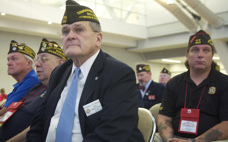Veterans listen to speeches at the Veterans of Foreign Wars National Convention in Pittsburgh, where President Barack Obama addressed several thousand members on Tuesday, July 21, 2015. Some are worried Obama is trying to cut veterans benefits, while others gave him credit for tackling the VA scandal.