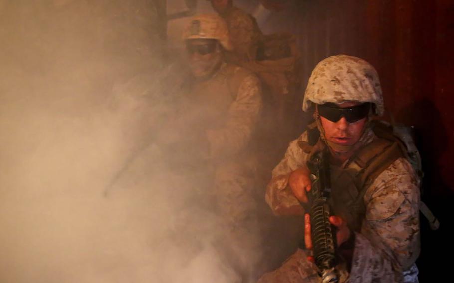 U.S. Navy corpsmen and Marines conduct tactical combat casualty care training during the Combat Trauma Management Course at the Strategic Operations facility, San Diego, on July 30, 2015.