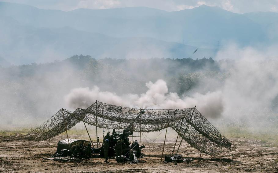 Soldiers from 6th Division of the Japan Ground Self-Defense Force fire artillery from a 155 mm howitzer Tuesday, Sept. 15, 2015, during Orient Shield at Ojojihara Maneuver Area in northeast Japan.
