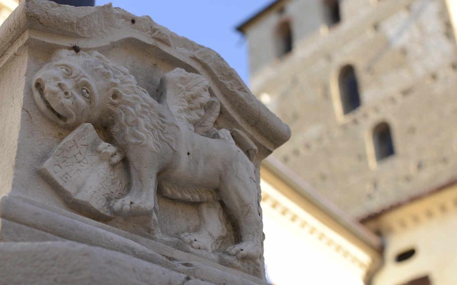 A whimsical lion adorns a pillar in the central square of Portobuffole, Italy, as the city's tower looms in the background. Lion lovers have plenty of representations to look at within just a few blocks.

Kent Harris/Stars and Stripes