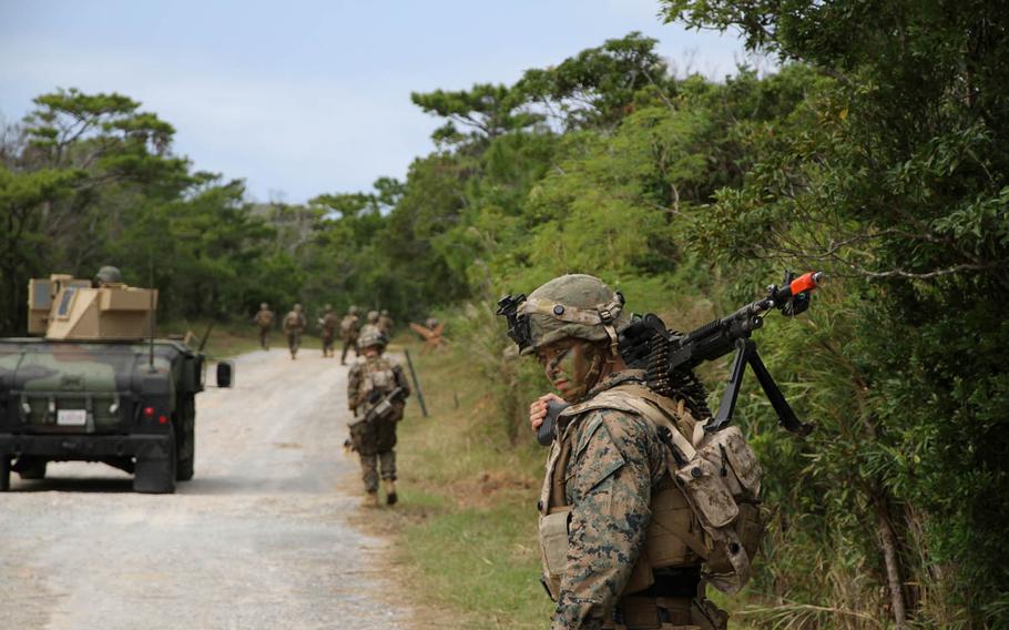 Marine Pvt. 1st Class Charles Hopson carries an M240 machine gun as Marines from 1st Platoon, Charlie Company, 1st Battalion, 2nd Marine Regiment move toward their objective Oct. 29, 2015, during exercise Blue Chromite 16. The exercise is designed to deliver interoperability training to stateside-based infantry units. The military saves money by using units already standing watch in the region without sacrificing readiness for crisis situations that might arise in the Pacific.