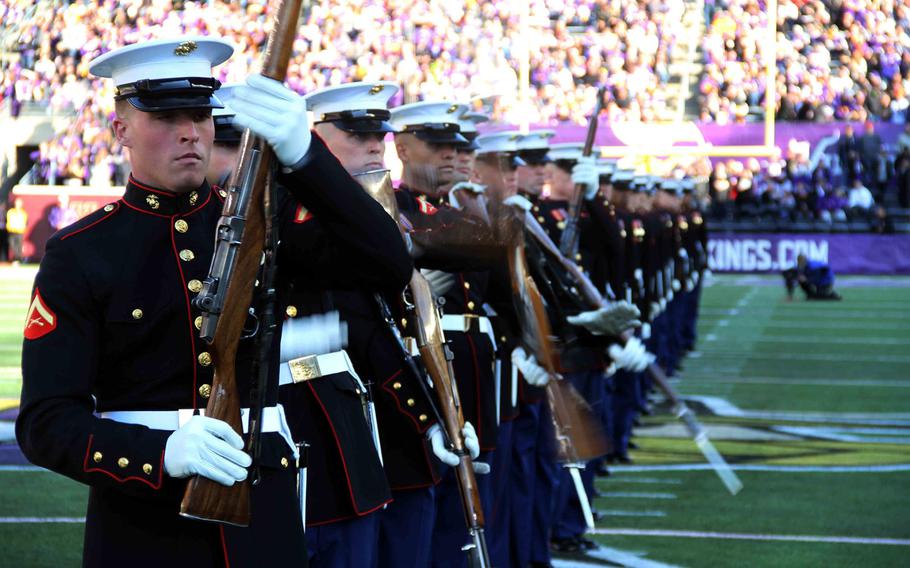 Marines with the Silent Drill Platoon perform at the Minnesota Vikings game, Nov. 8, 2015 in Minneapolis, Minn.