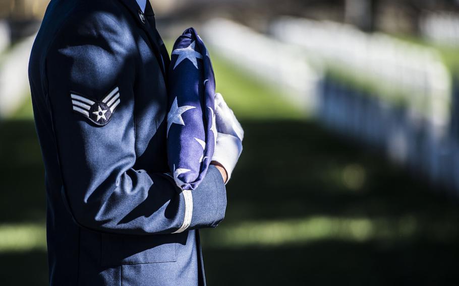 A Langley Honor Guardsman prepares to perform a flag folding ceremony during a Veterans Day Wreath Laying in Hampton, Va., Nov. 11, 2015.