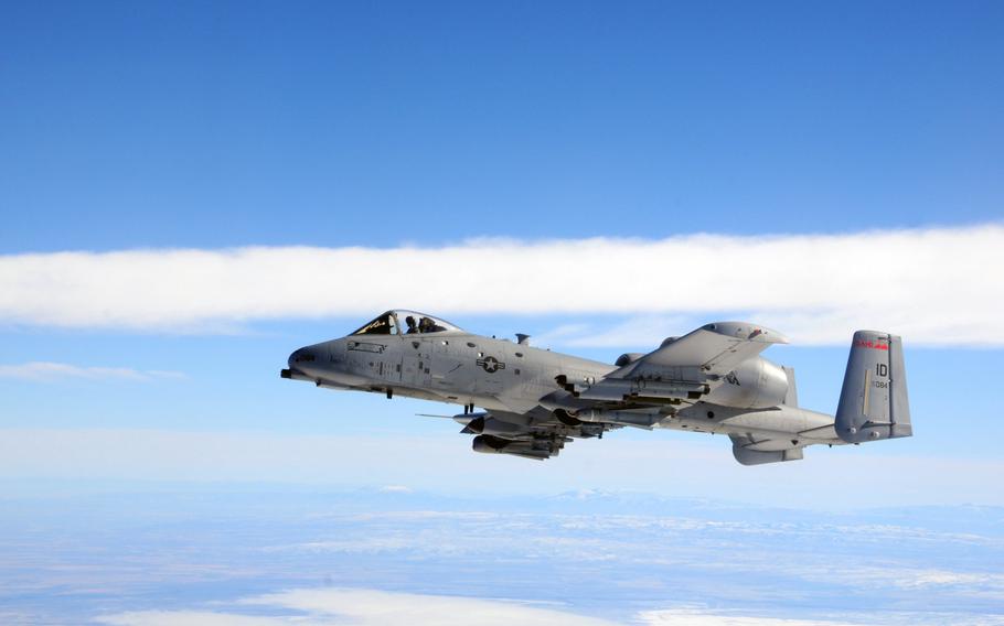 An Idaho Air National Guard A-10, Thunderbolt II, flies over southern Idaho after receiving fuel from a Utah Air National Guard KC-135R Stratotanker on Nov. 8, 2015.