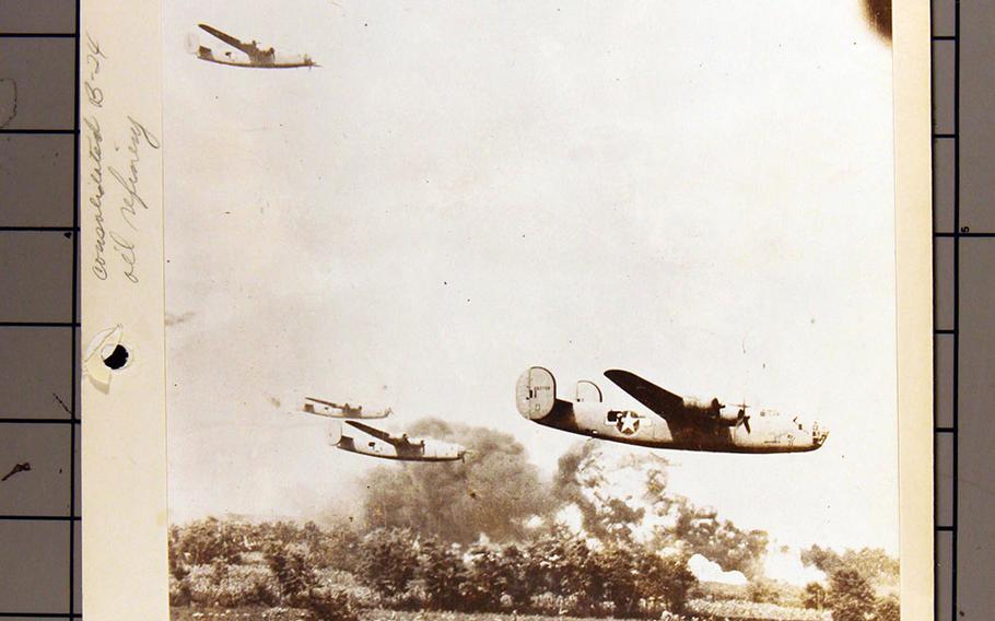 A photographed National Archives document shows the low-level flying of some of the 177 B-24 Liberator bombers as they begin a bombing run of Hitler's oil fields in Ploesti, Romania, Aug. 1, 1943.