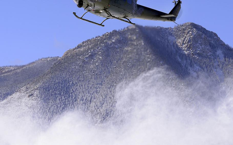 A UH-1N ''Huey'' from the 37th Helicopter Squadron at F.E. Warren Air Force Base, Wyo., lands at the U.S. Air Force Academy's Preparatory School in Colorado Springs, Colo., on Monday, Nov. 30, 2015.