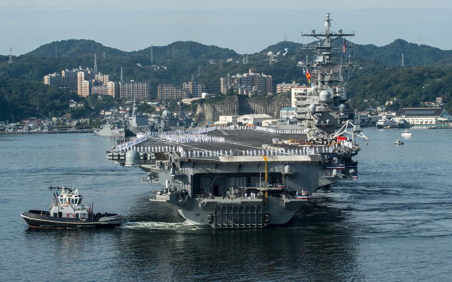 The aircraft carrier USS Ronald Reagan arrives at Yokosuka Naval Base, Japan, Oct. 1, 2015. The nuclear-powered carrier was the focus of a radiation-leak disaster exercise between the U.S. Navy and Japanese government this week in Yokosuka.