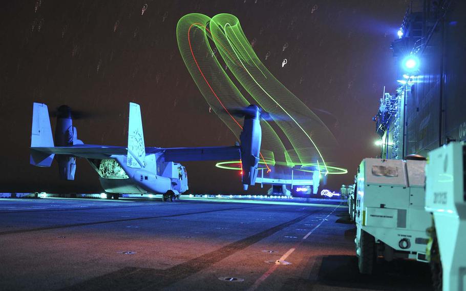 An MV-22 Osprey assigned to Marine Medium Tilt Squadron 166 launches from the amphibious assault ship USS Boxer in support of a long-range raid exercise Dec. 12, 2015.