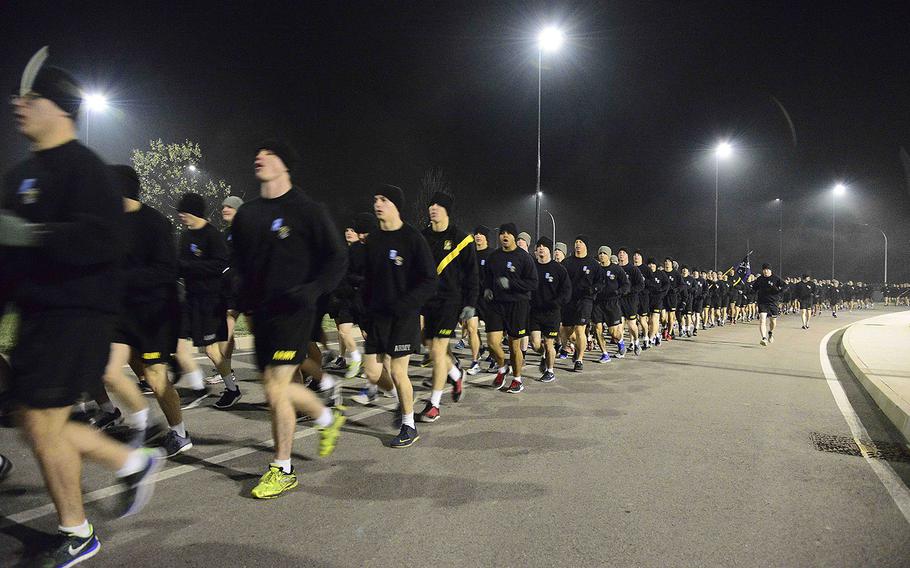 U.S. paratroops assigned to the 2nd Battalion, 503rd Infantry Regiment, 173rd Airborne Brigade, participate in the battalion run at Caserma Del Din, Vicenza, Italy, Dec. 16, 2015.