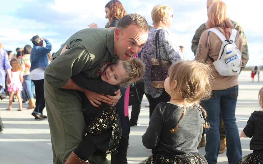 Friends and family welcome home a Marine with Marine Medium Tiltrotor Squadron 161 at Marine Corps Air Station Miramar, Calif. Dec. 13, 2015.